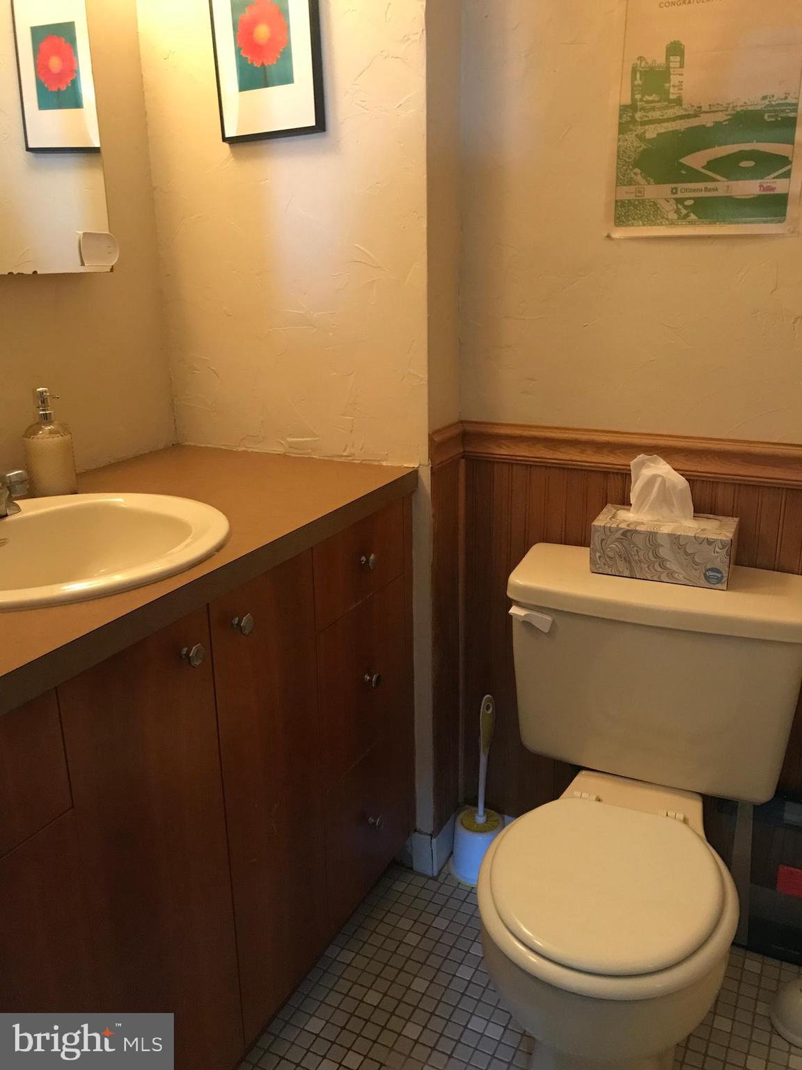 9585 James Street, Unit B Philadelphia, PA 19114 - Photo 14 of 26 a bathroom with a toilet and a sink