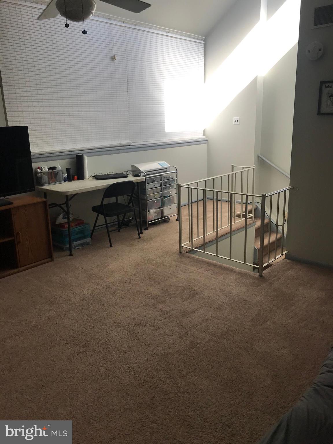 9585 James Street, Unit B Philadelphia, PA 19114 - Photo 20 of 26 a view of a workspace with furniture