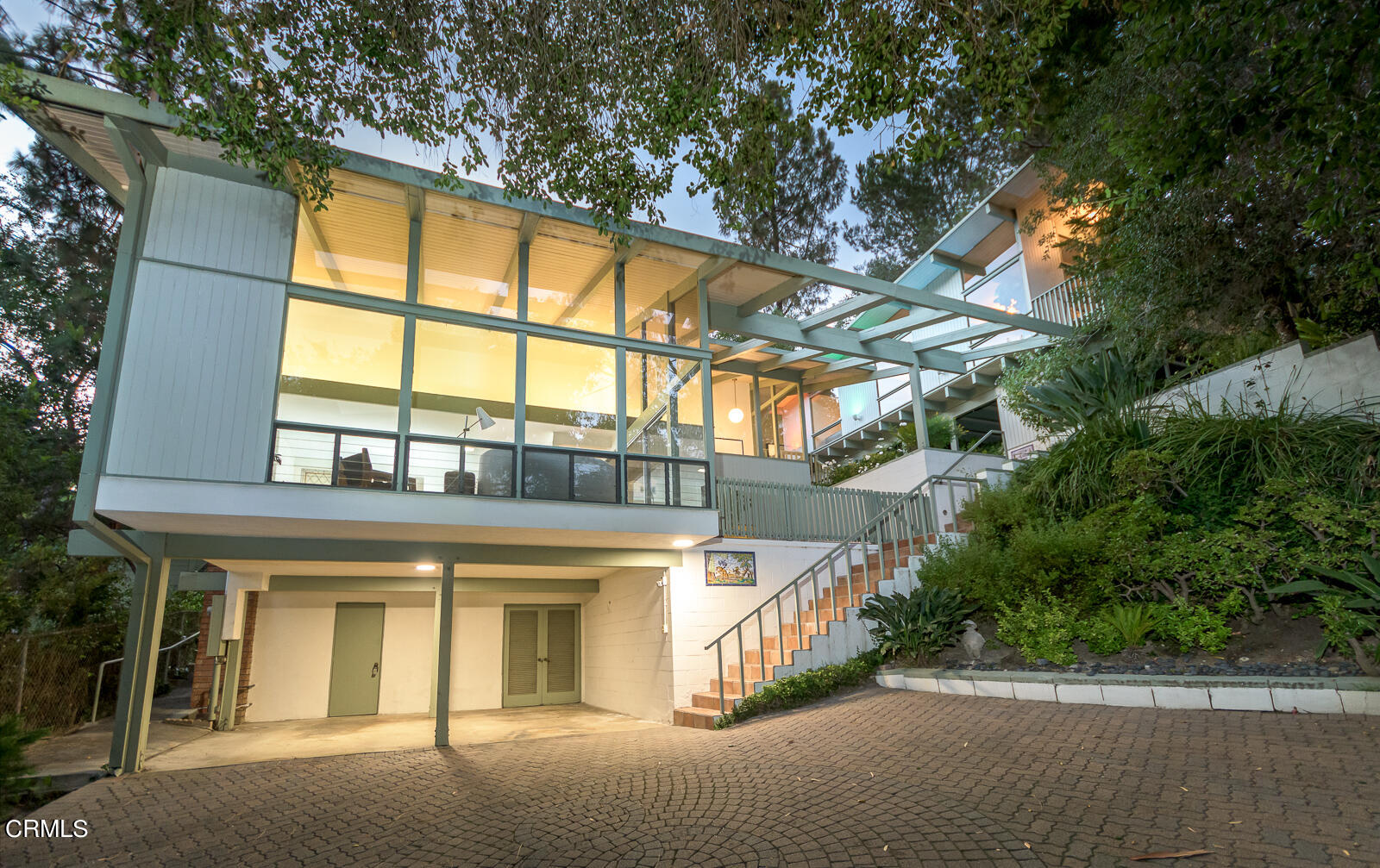 a view of a building with a tree