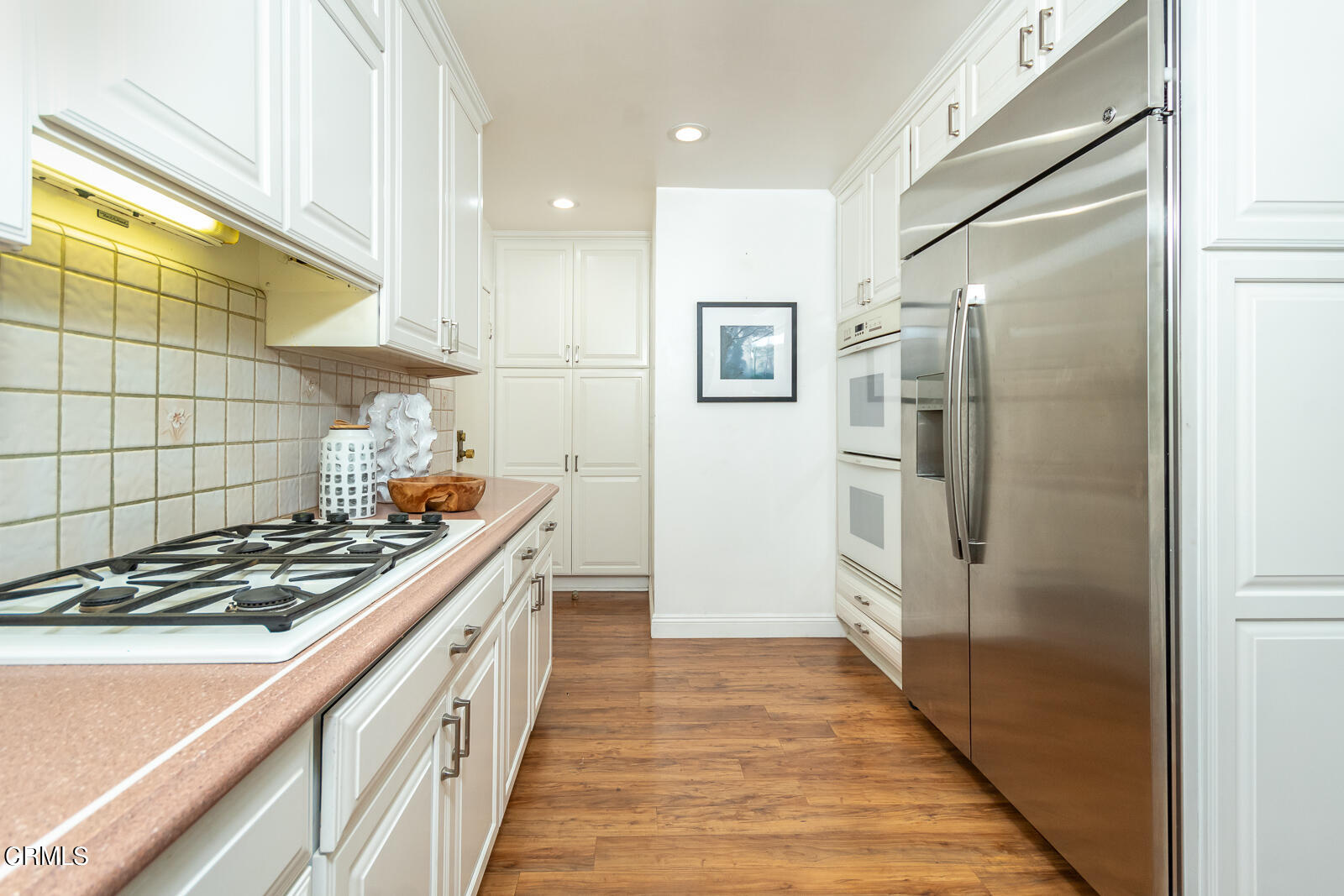 1437 Hillside Drive Glendale, CA 91208 - Photo 11 of 29 a kitchen with a stove and a refrigerator