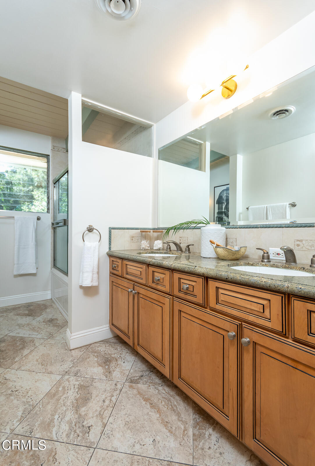 1437 Hillside Drive Glendale, CA 91208 - Photo 18 of 29 a spacious bathroom with a granite countertop sink and a mirror
