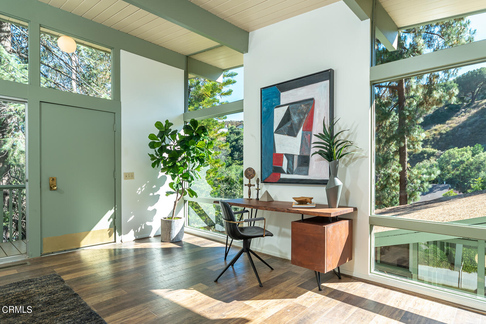 1437 Hillside Drive Glendale, CA 91208 - Photo 23 of 29 a living room with a floor to ceiling window and wooden floor