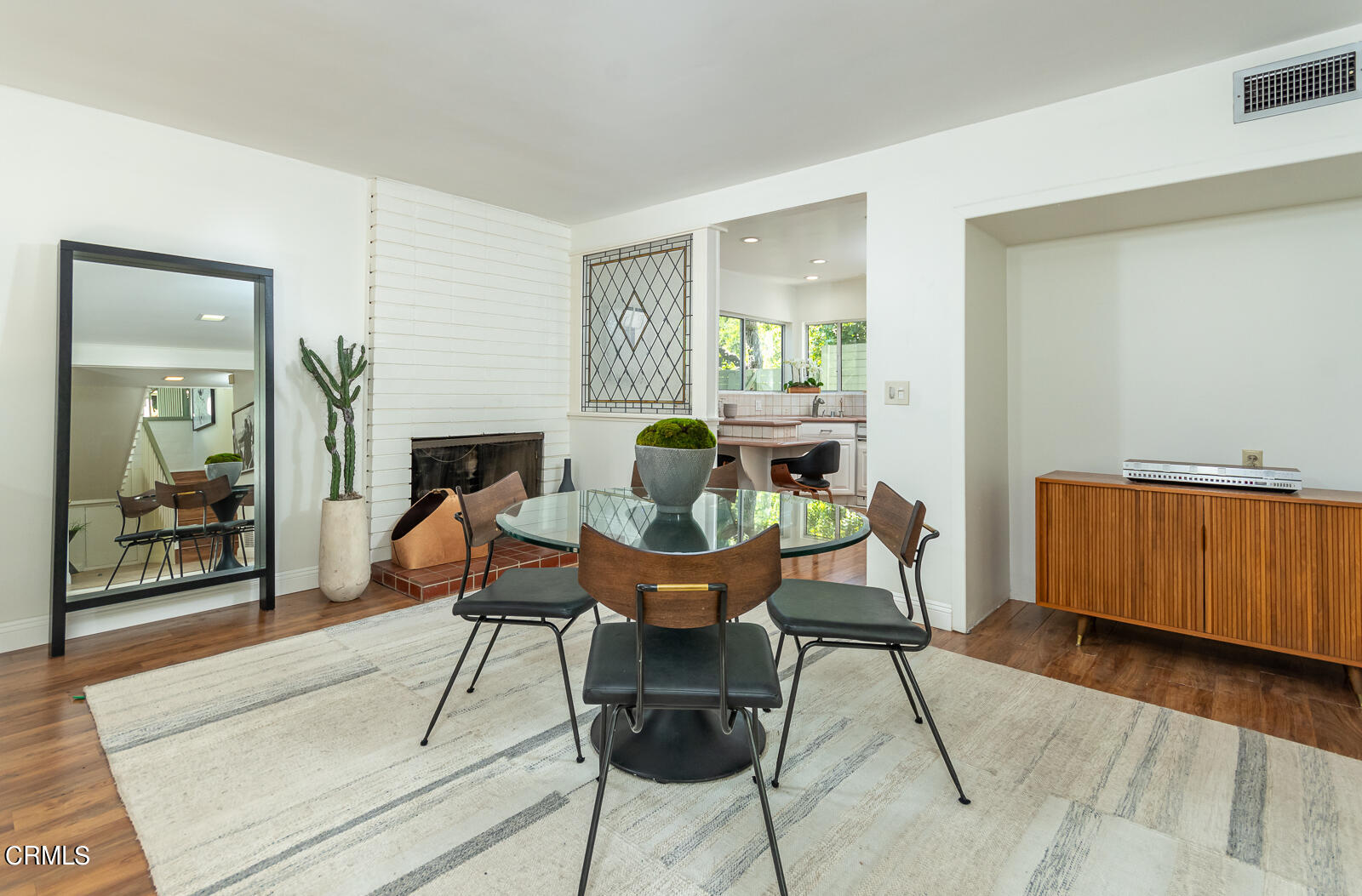1437 Hillside Drive Glendale, CA 91208 - Photo 9 of 29 a dining room with furniture and wooden floor