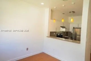 a view of a living room with a sink