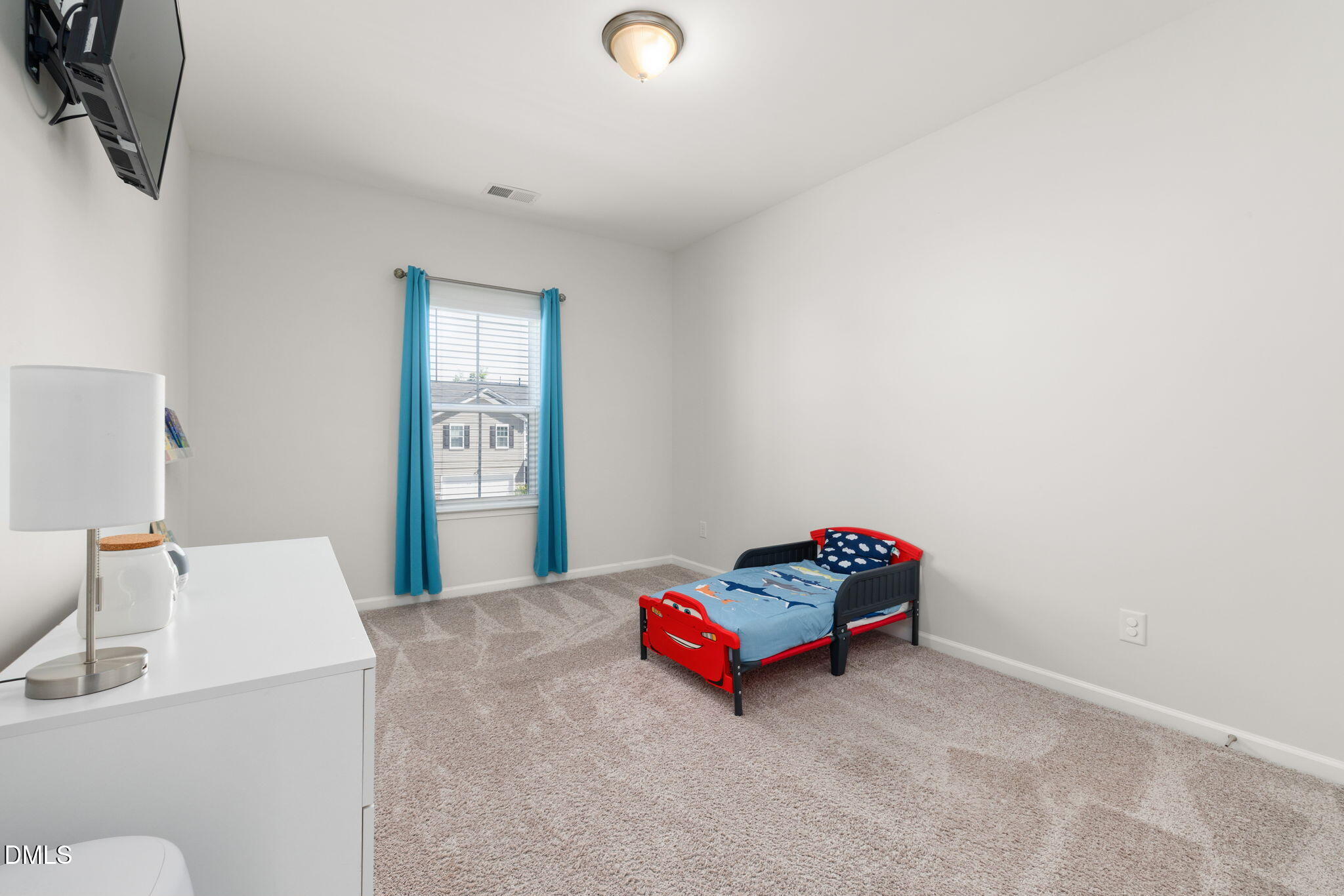 3422 Longleaf Estates Drive Raleigh, NC 27616 - Photo 39 of 71 a living room with a couch and a window