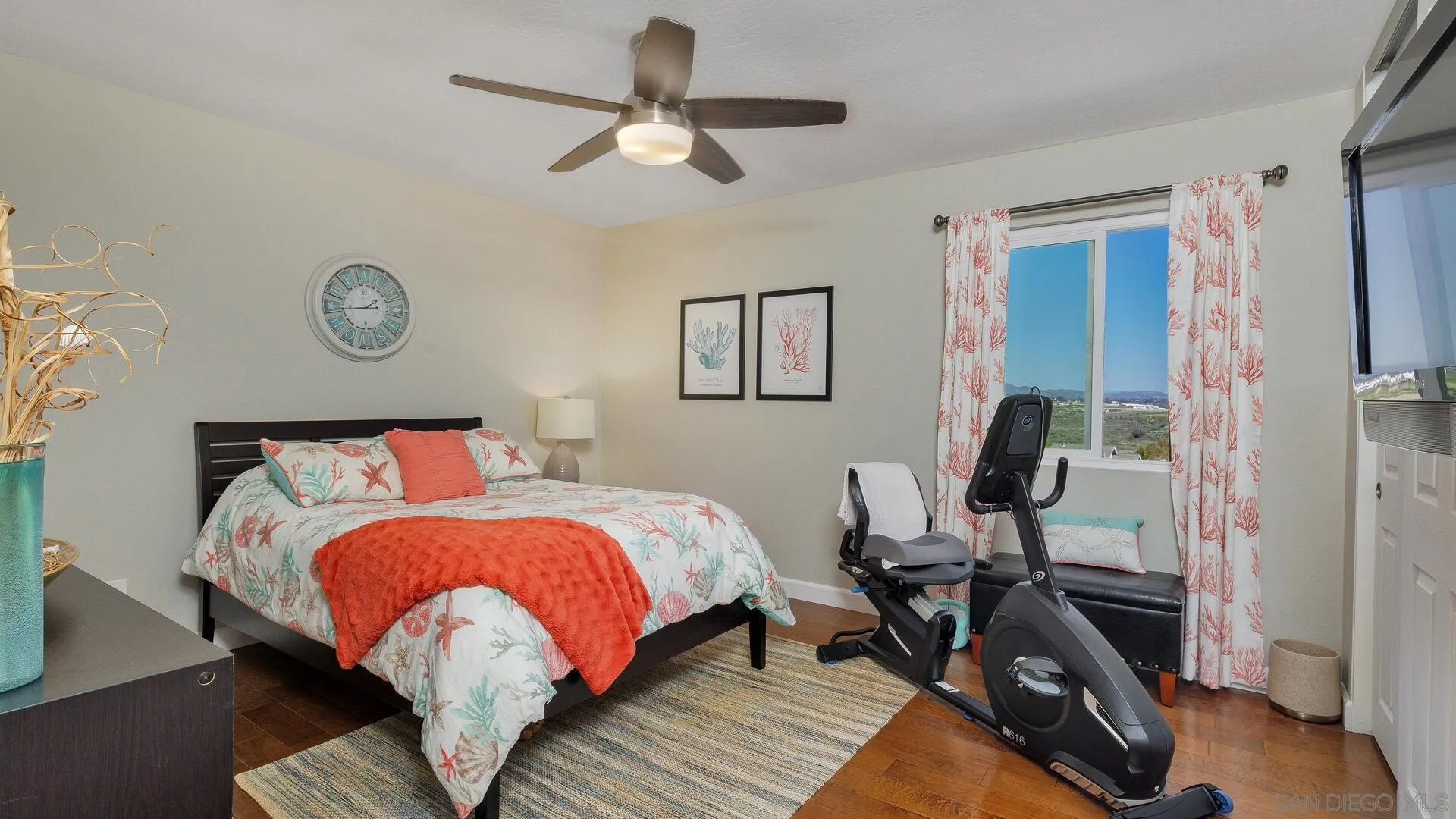 388 Compass Road Oceanside, CA 92054 - Photo 11 of 15 a bed room with a bed mirror and a window