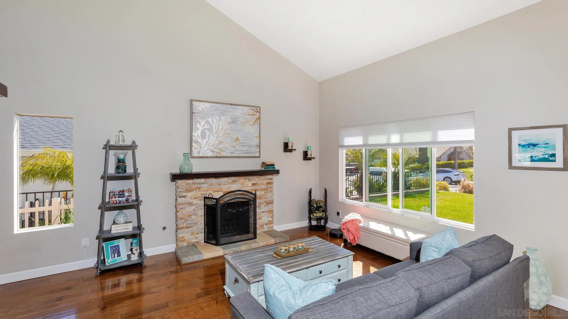 388 Compass Road Oceanside, CA 92054 - Photo 2 of 15 a living room with furniture and a fireplace