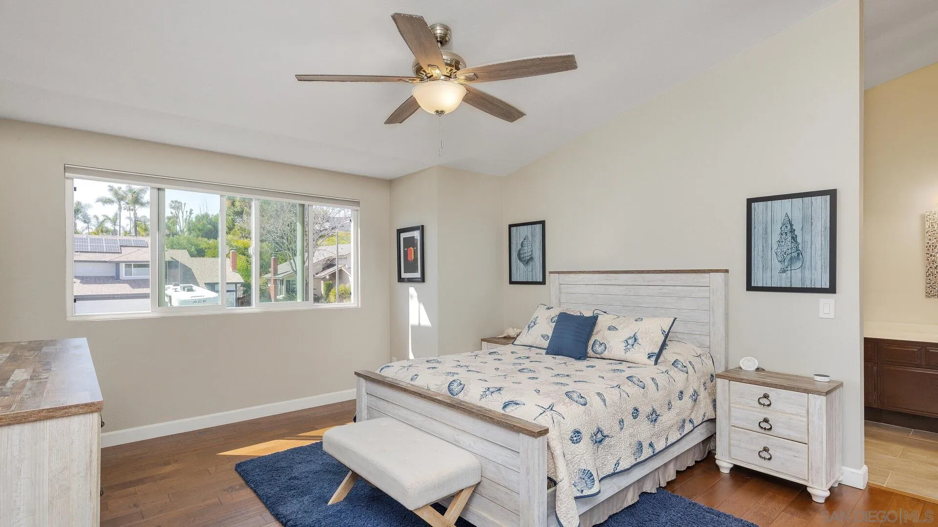 388 Compass Road Oceanside, CA 92054 - Photo 10 of 15 a bedroom with a bed a window and a potted plant on a dresser
