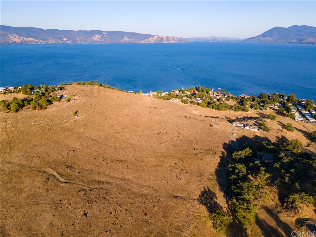 3755 Lakeshore Boulevard Lakeport, CA 95453 - Photo 1 of 16 a view of a mountain with a lake