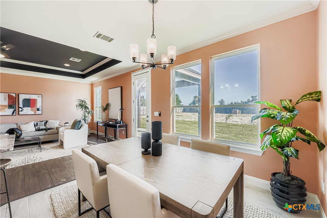 222 Arosa Drive Elgin, TX 78621 - Photo 20 of 40 a view of a dining room with furniture window and outside view