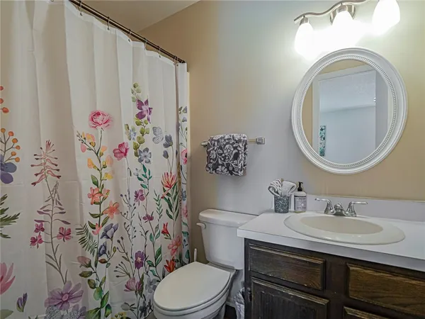 a view of a livingroom with wooden floor and closet