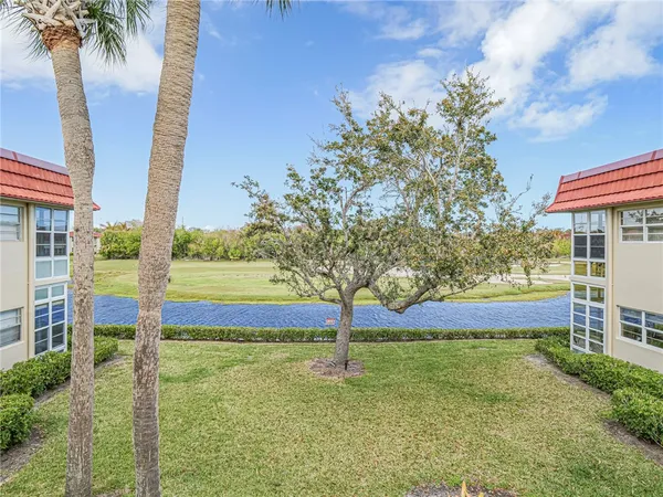 a view of a car parked in front of a building