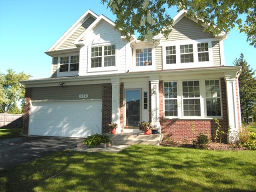 229 South Hunt Club Road Gurnee, IL 60031 - Photo 1 of 1 a front view of a house with a yard