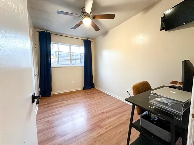 a workspace with furniture and window