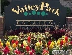 1043 Rottkamp Street, Unit 1 Valley Stream, NY 11580 - Photo 1 of 1 a close up of a sign