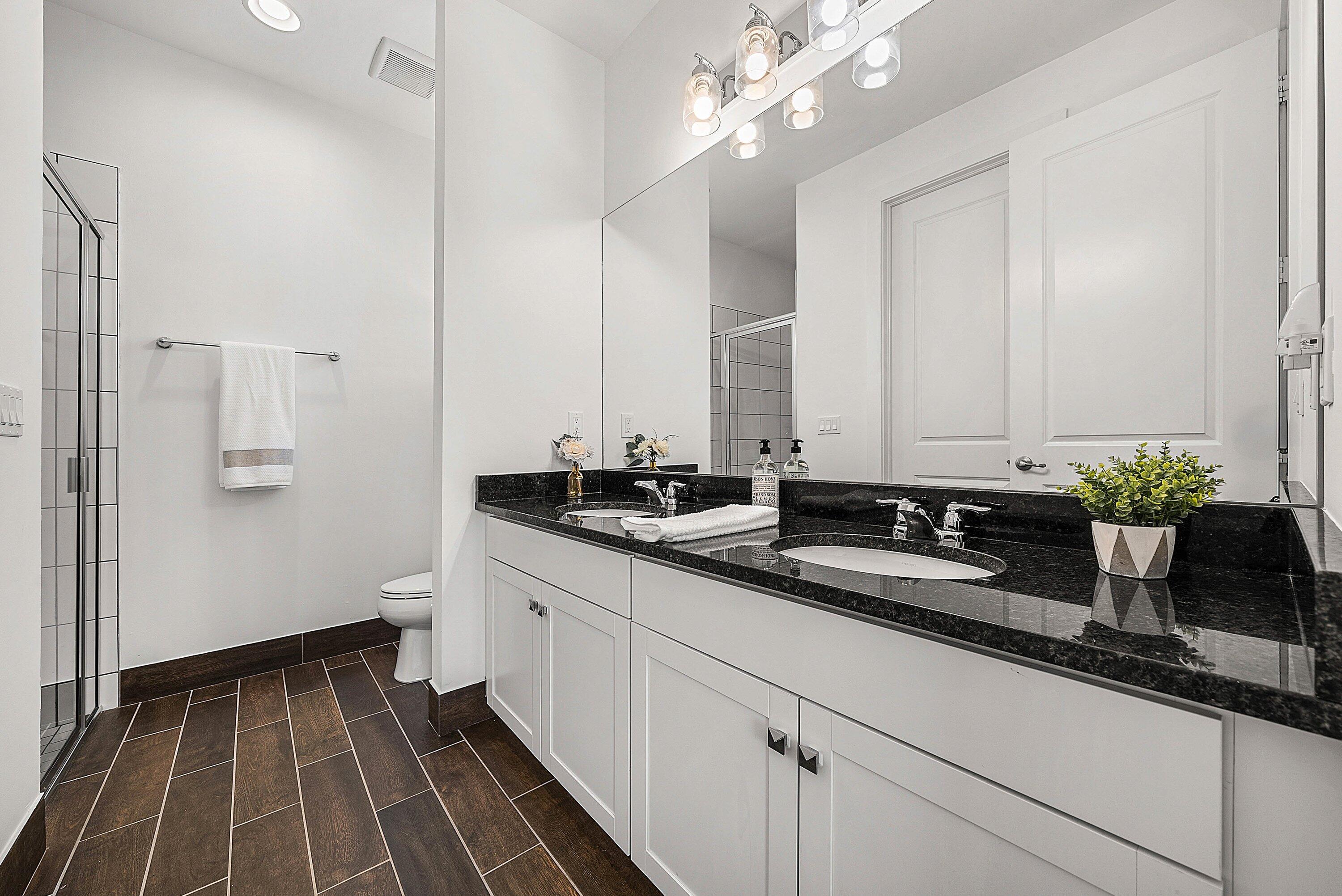 1107 Timber Reap Trail Loxahatchee, FL 33470 - Photo 22 of 83 a bathroom with a sink and a mirror