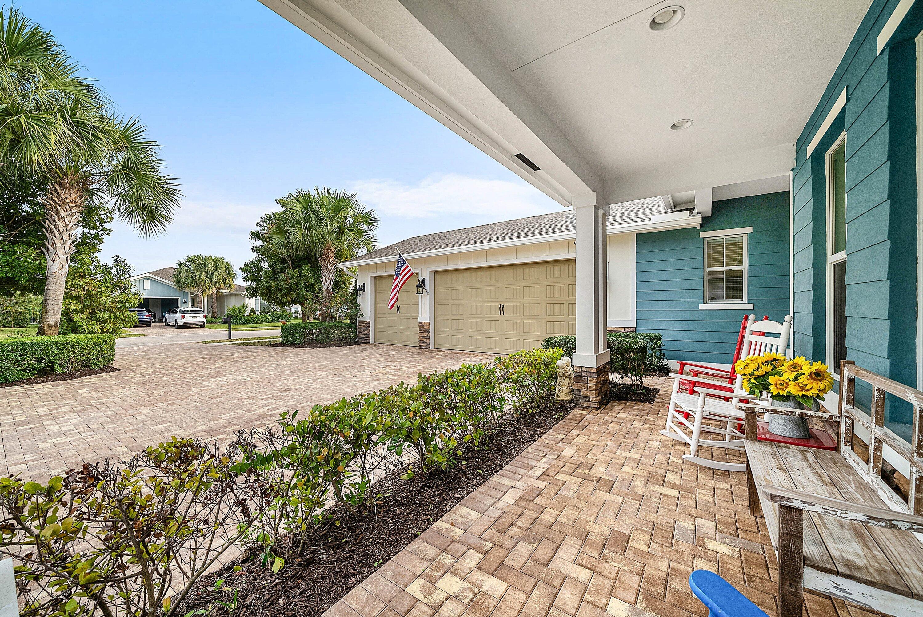 1107 Timber Reap Trail Loxahatchee, FL 33470 - Photo 3 of 83 a backyard of a house with outdoor seating