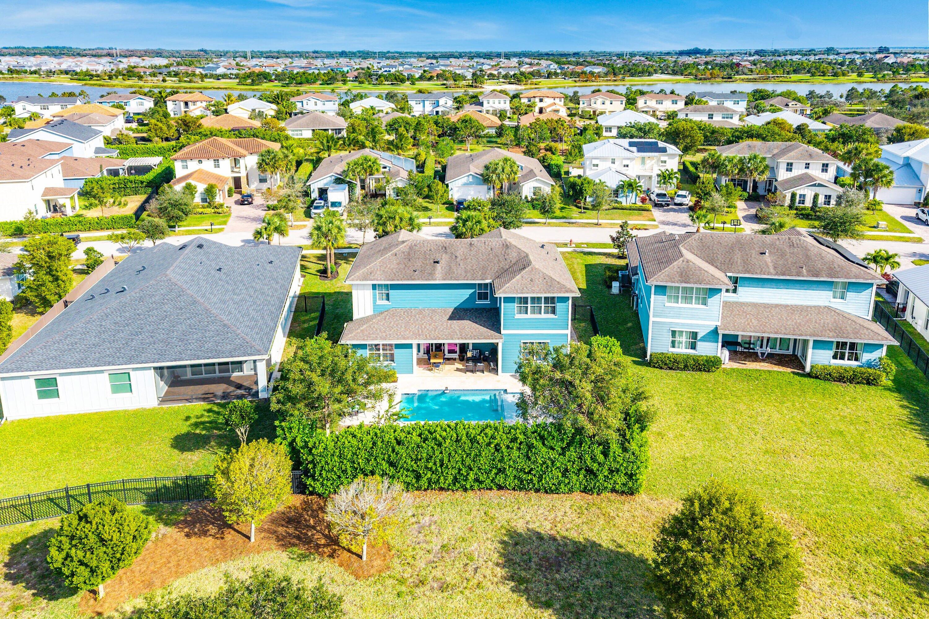 1107 Timber Reap Trail Loxahatchee, FL 33470 - Photo 47 of 83 an aerial view of residential houses with yard