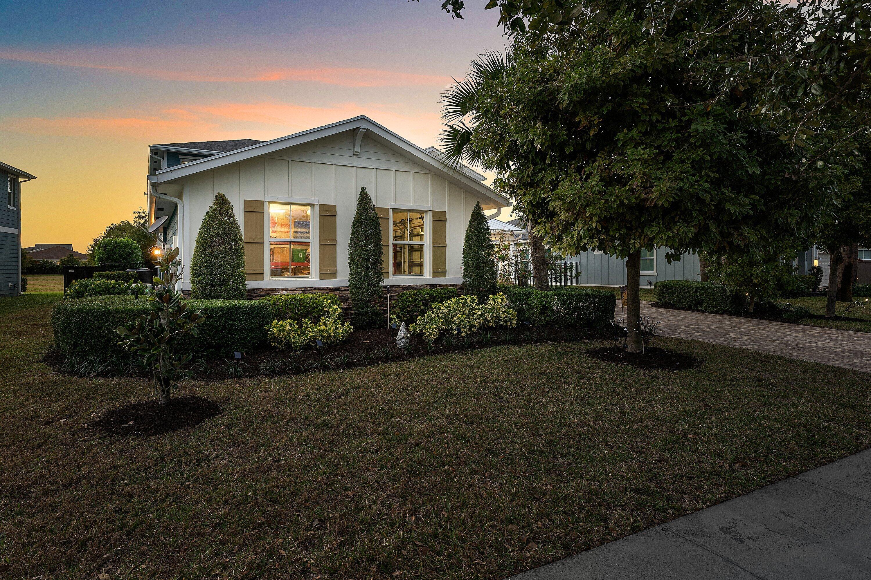 1107 Timber Reap Trail Loxahatchee, FL 33470 - Photo 56 of 83 a view of a house with backyard and garden