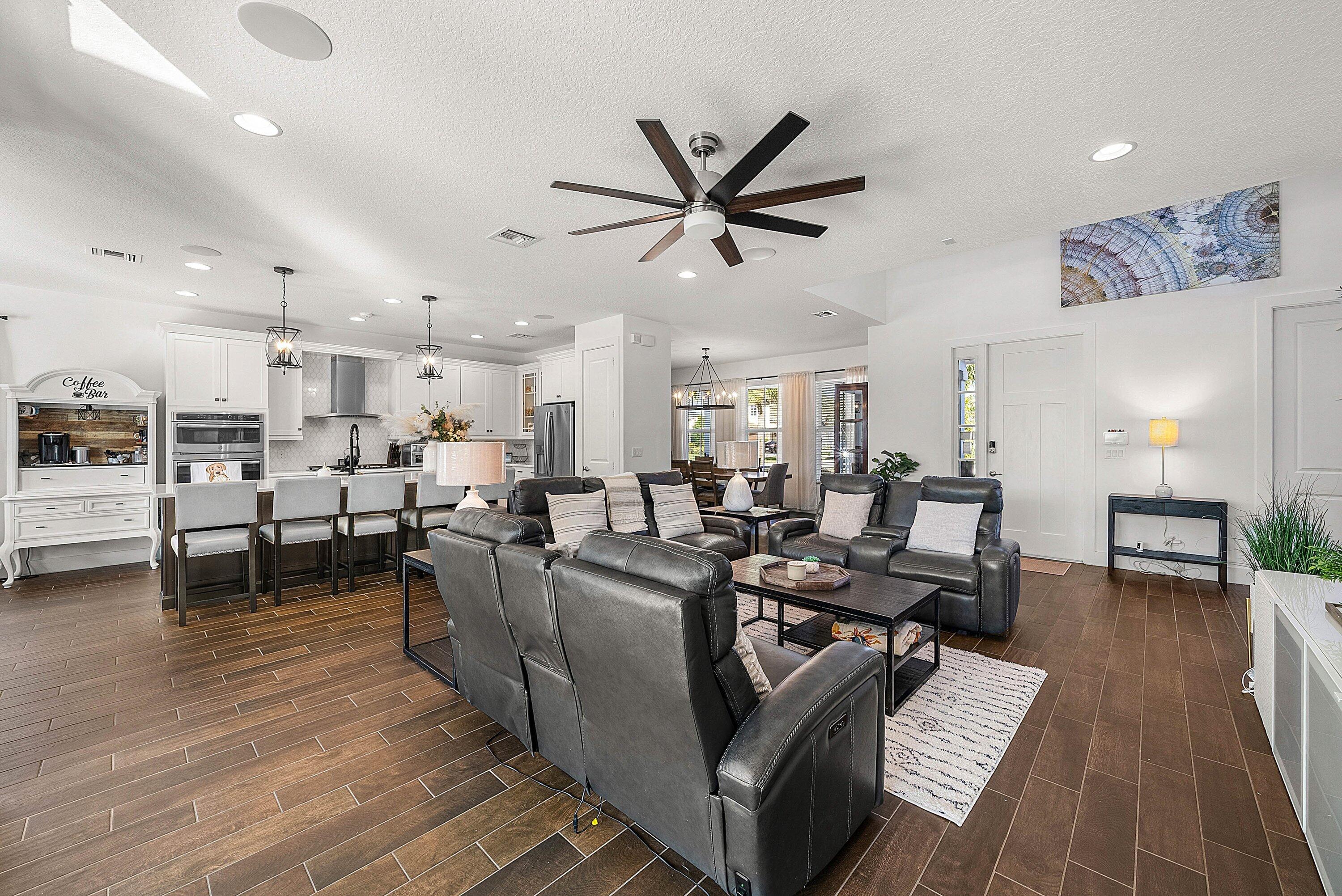 1107 Timber Reap Trail Loxahatchee, FL 33470 - Photo 7 of 83 a living room with lots of furniture and a view of kitchen