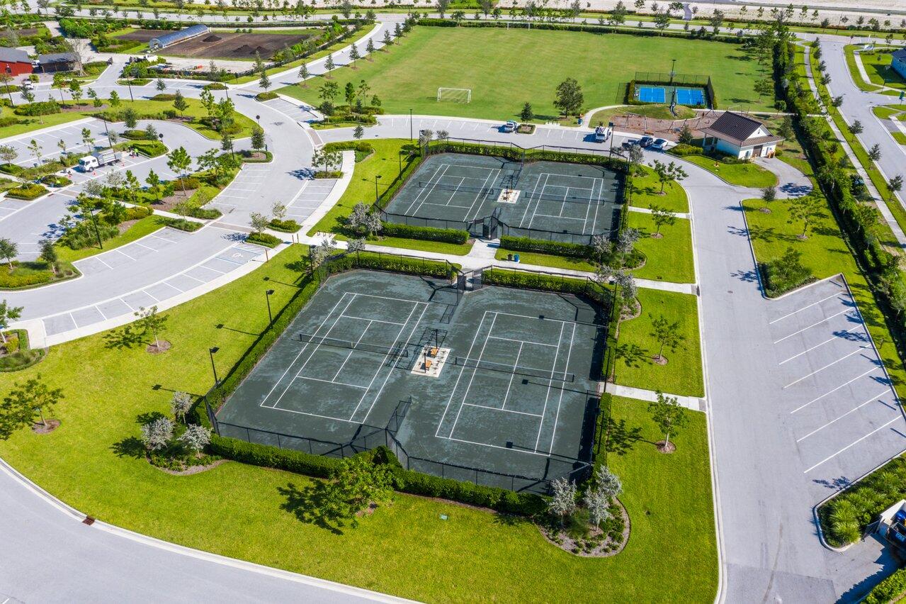 1107 Timber Reap Trail Loxahatchee, FL 33470 - Photo 75 of 83 an aerial view of a house with a yard basket ball court and outdoor seating