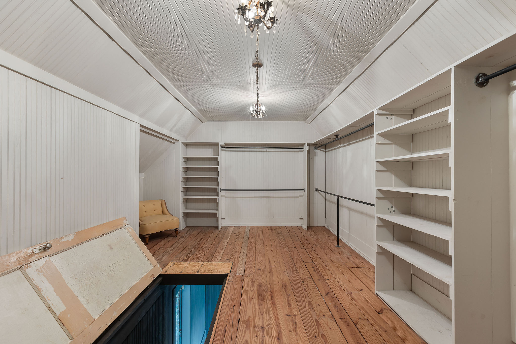 948 Maple Street Lockhart, TX 78644 - Photo 24 of 40 Ample built-in shelving and hardwood floors define this well-appointed closet space.