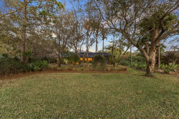 a utility room with sink dryer and washer