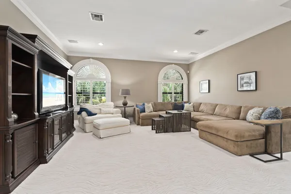 a bathroom with a sink double vanity granite tub and shower
