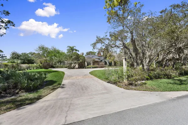 a view of a lake with a building in the background