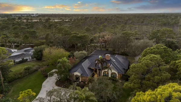 a view of outdoor space with trees all around