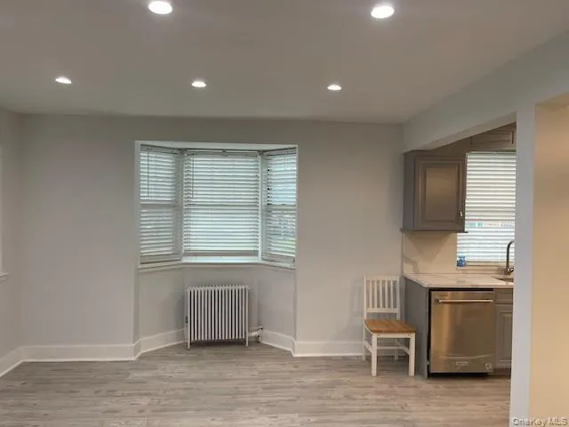 a view of livingroom with furniture and windows