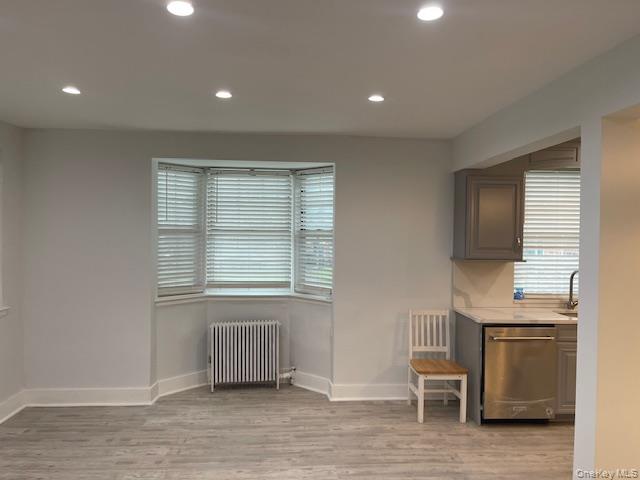 138-28 77th Avenue, Unit 64C Queens, NY 11367 - Photo 4 of 12 a view of livingroom with furniture and windows