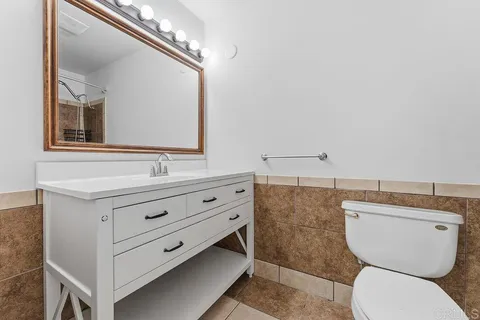 a bathroom with a bathtub and shower