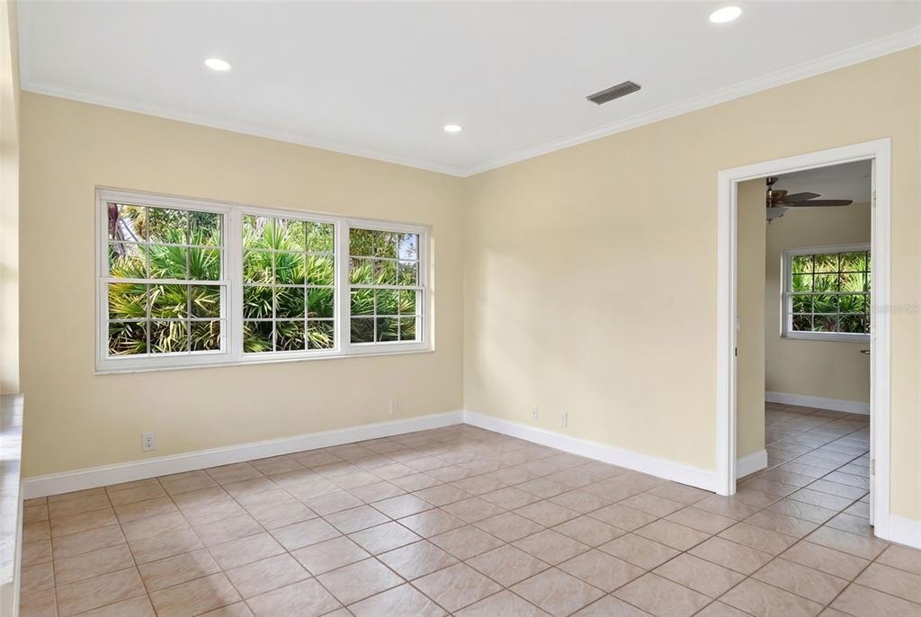 7108 Midnight Pass Road Sarasota, FL 34242 - Photo 48 of 83 a view of an empty room with a window