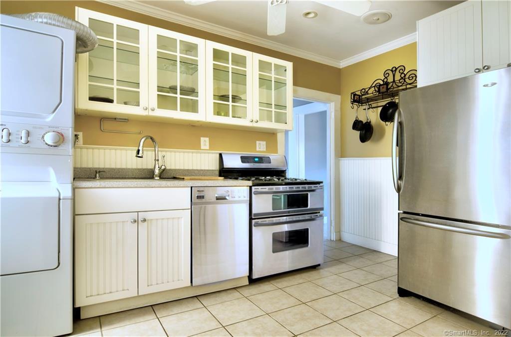 37 Rowsley Street, Unit 6 Bridgeport, CT 06605 - Photo 2 of 17 a kitchen with a refrigerator and a sink