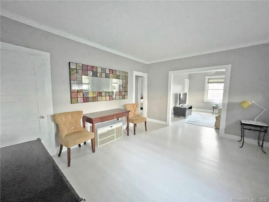 37 Rowsley Street, Unit 6 Bridgeport, CT 06605 - Photo 7 of 17 a living room with furniture and a table