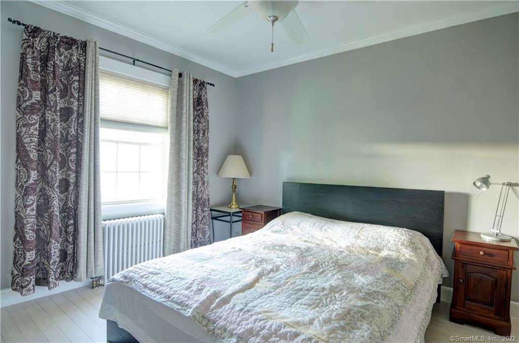 37 Rowsley Street, Unit 6 Bridgeport, CT 06605 - Photo 10 of 17 a bedroom with a bed and a window