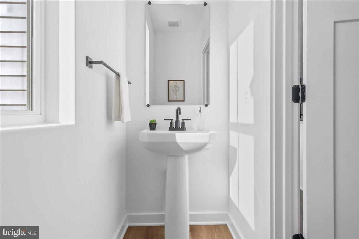 641 Swallowtail Drive Frederick, MD 21703 - Photo 24 of 52 a bathroom with a sink and a mirror