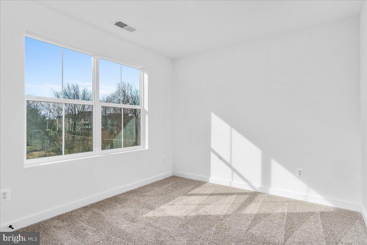 641 Swallowtail Drive Frederick, MD 21703 - Photo 35 of 52 an empty room with a window