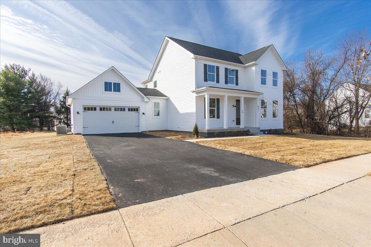 641 Swallowtail Drive Frederick, MD 21703 - Photo 42 of 52 a view of the house with a yard