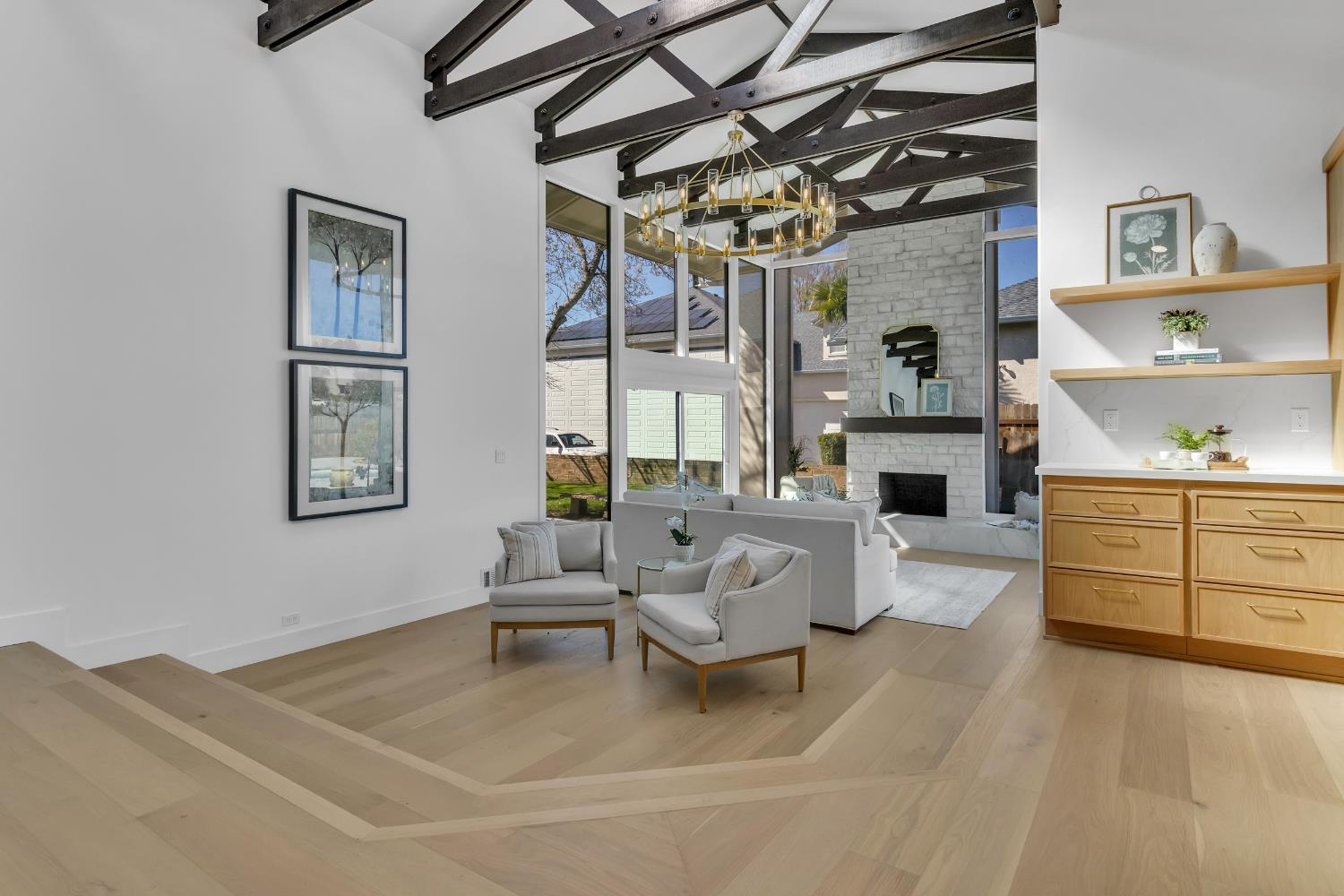 3053 Boeing Road Cameron Park, CA 95682 - Photo 12 of 67 a living room with furniture and a chandelier