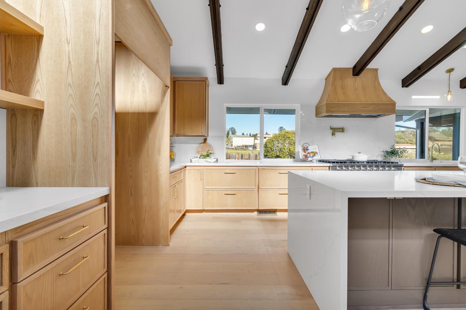 3053 Boeing Road Cameron Park, CA 95682 - Photo 17 of 67 a kitchen with stainless steel appliances kitchen island granite countertop a stove a sink and a refrigerator