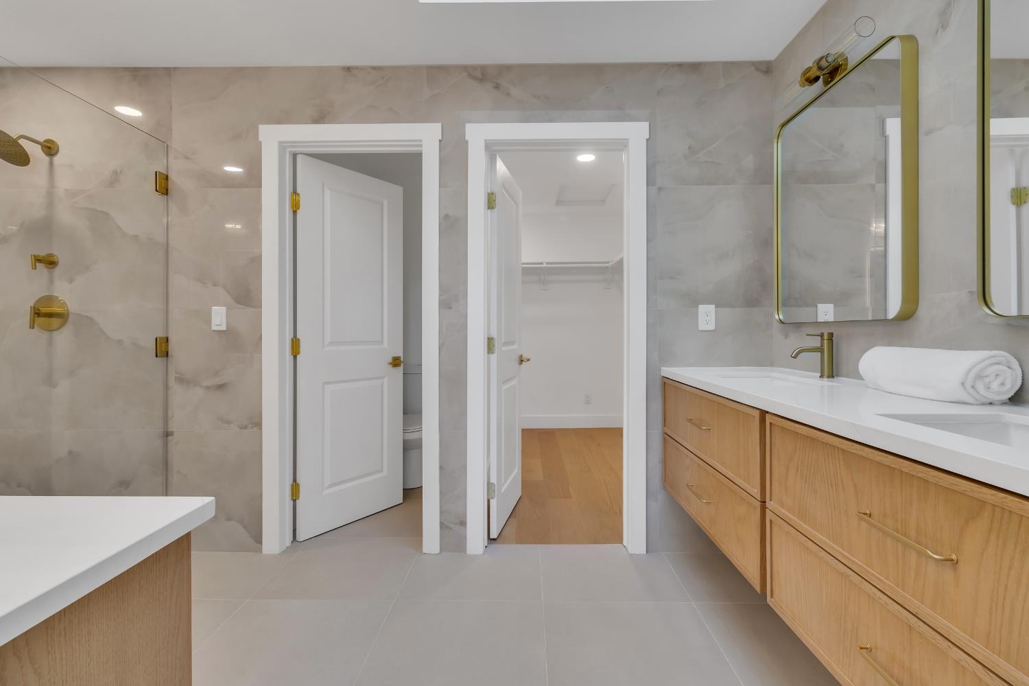 3053 Boeing Road Cameron Park, CA 95682 - Photo 26 of 67 a bathroom with a granite countertop sink mirror and shower