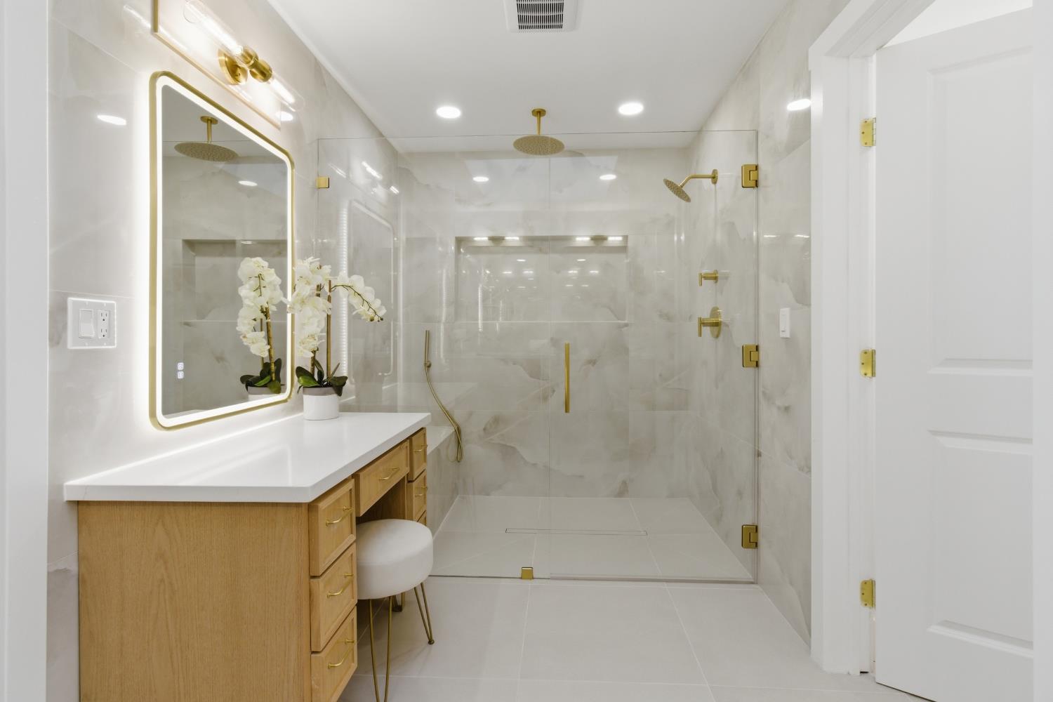 3053 Boeing Road Cameron Park, CA 95682 - Photo 29 of 67 a bathroom with a shower sink and mirror