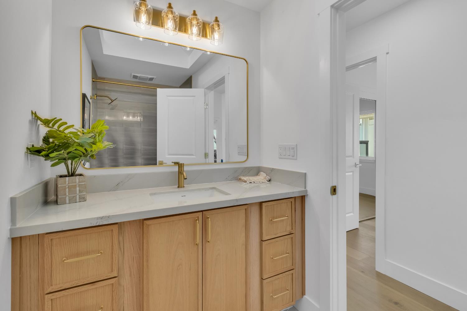 3053 Boeing Road Cameron Park, CA 95682 - Photo 36 of 67 a bathroom with a sink a vanity and a mirror