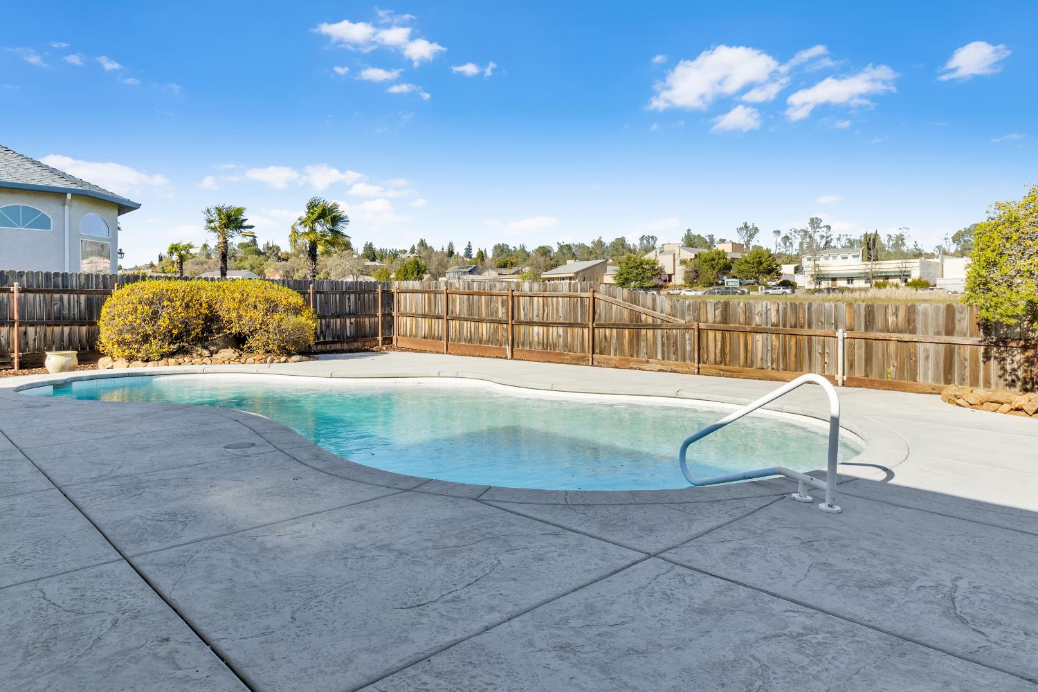 3053 Boeing Road Cameron Park, CA 95682 - Photo 45 of 67 a swimming pool with an outdoor seating and yard