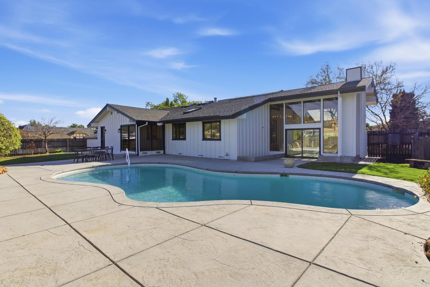 3053 Boeing Road Cameron Park, CA 95682 - Photo 47 of 67 a view of a house with swimming pool and a yard