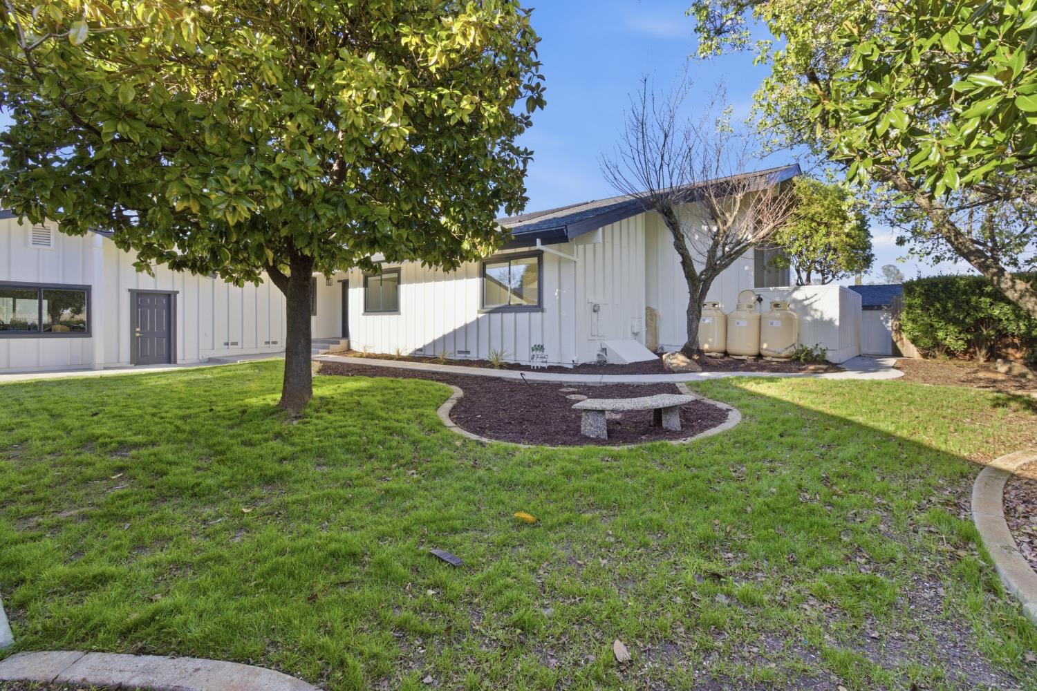 3053 Boeing Road Cameron Park, CA 95682 - Photo 51 of 67 a view of a house with a yard