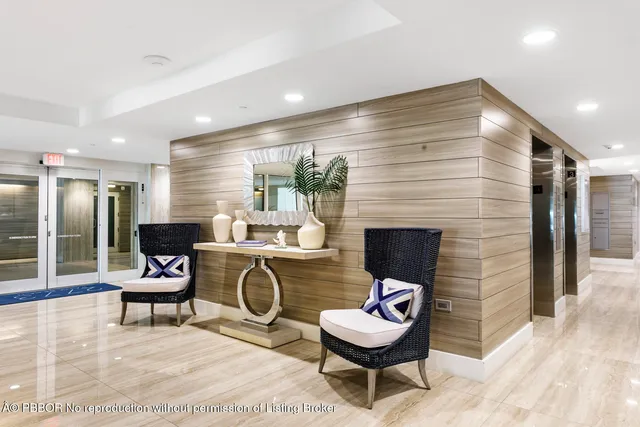 a outdoor living space with furniture and a rug