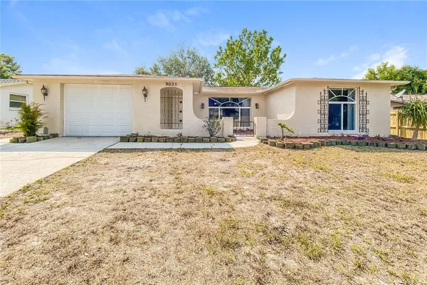 a view of a house with a patio